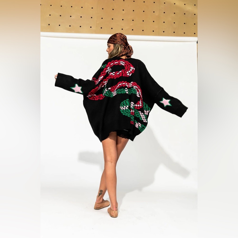 Dressed in LALA Black Cardigan with Red and Green Snake Design